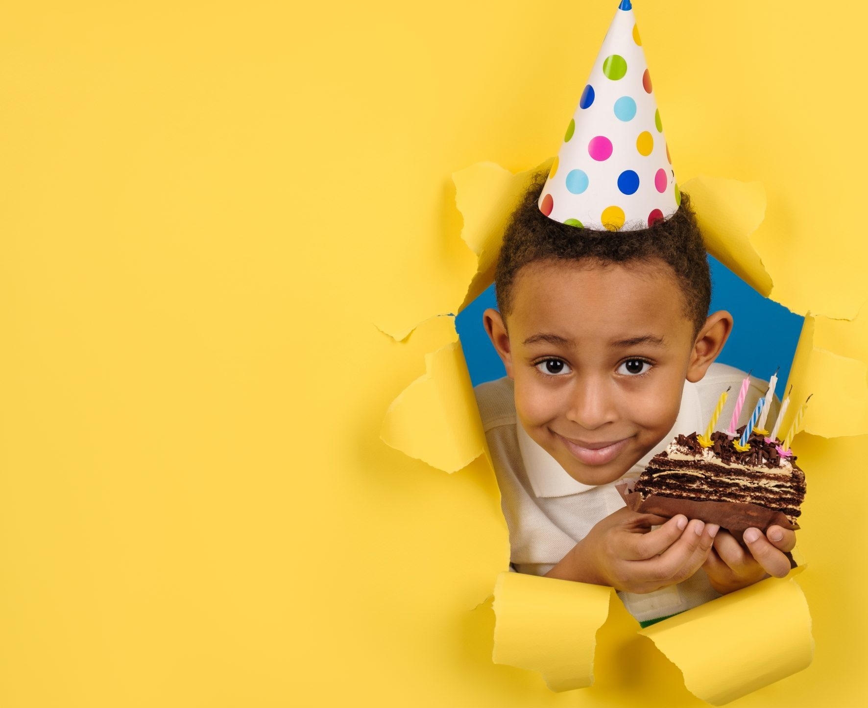Happy,African-american,Boy,Celebrates,Birthday,By,Holding,A,Chocolate,Cake